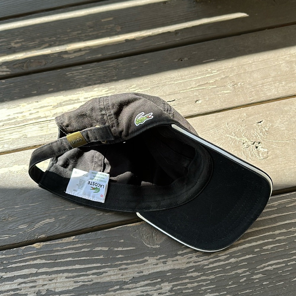 Black Lacoste hat